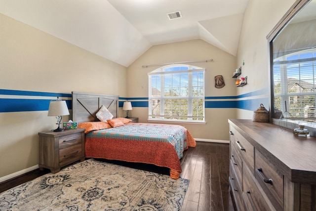 25611 Kearsley Dr, Katy, TX 77494 - bedroom featuring dark wood-style floors, multiple windows, baseboards, and vaulted ceiling