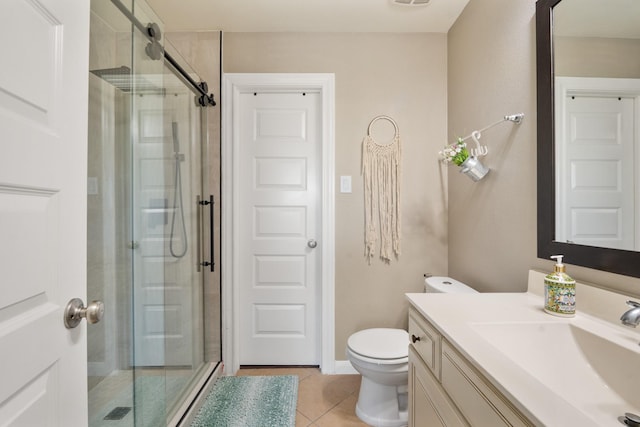 25611 Kearsley Dr, Katy, TX 77494 - full bath with a stall shower, vanity, toilet, and tile patterned floors