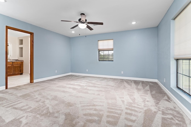 11161 Blue Bonnet Ln, Beaumont, TX 77705 - spare room with carpet flooring, ceiling fan, plenty of natural light, and recessed lighting