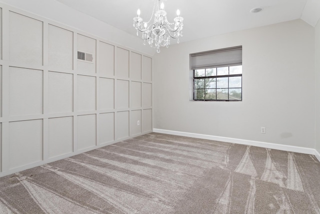 11161 Blue Bonnet Ln, Beaumont, TX 77705 - empty room with carpet flooring, a chandelier, baseboards, and vaulted ceiling