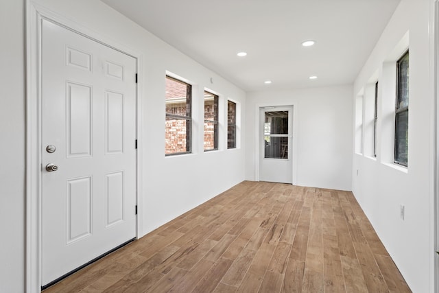 11161 Blue Bonnet Ln, Beaumont, TX 77705 - empty room featuring light wood-type flooring and recessed lighting