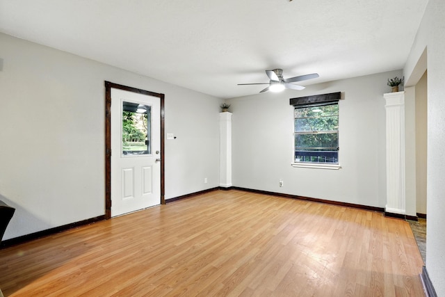 71 White Oak St, Point Blank, TX 77364 - unfurnished room featuring light wood-style floors, ceiling fan, and baseboards