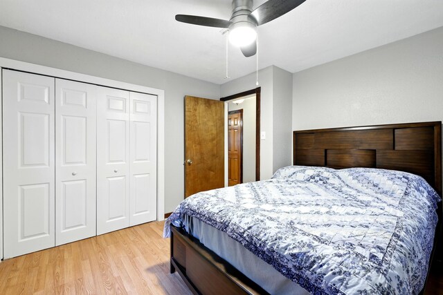 71 White Oak St, Point Blank, TX 77364 - bedroom with light wood finished floors, a closet, and ceiling fan
