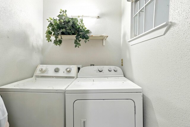 71 White Oak St, Point Blank, TX 77364 - laundry room featuring washer and clothes dryer