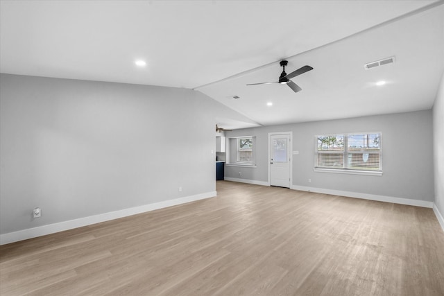 607 Mary Ann Dr, Friendswood, TX 77546 - unfurnished living room featuring a ceiling fan, baseboards, vaulted ceiling, and light wood finished floors