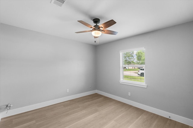 607 Mary Ann Dr, Friendswood, TX 77546 - spare room with light wood-style flooring, baseboards, and a ceiling fan