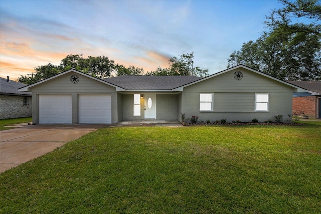 607 Mary Ann Dr, Friendswood, TX 77546 - ranch-style home featuring an attached garage, driveway, a lawn, and brick siding