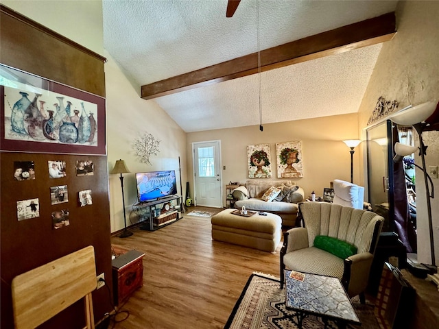 1347 Cardinal Ln, Trinity, TX 75862 - living area featuring a textured ceiling, ceiling fan, wood finished floors, and baseboards