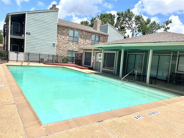 3754 Tanglewilde St Unit 9, Houston, TX 77063 - community pool with a patio area