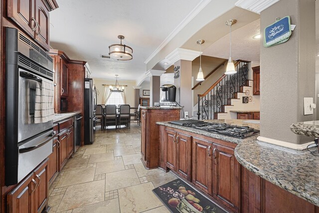 2218 Cherry Ln, Pasadena, TX 77502 - kitchen featuring crown molding, appliances with stainless steel finishes, stone tile flooring, pendant lighting, and a chandelier