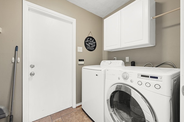 2218 Cherry Ln, Pasadena, TX 77502 - washroom featuring cabinet space, independent washer and dryer, a textured ceiling, and baseboards
