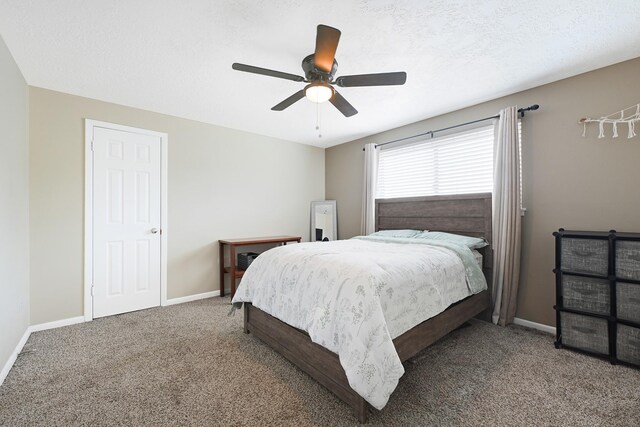 2218 Cherry Ln, Pasadena, TX 77502 - carpeted bedroom featuring baseboards and ceiling fan