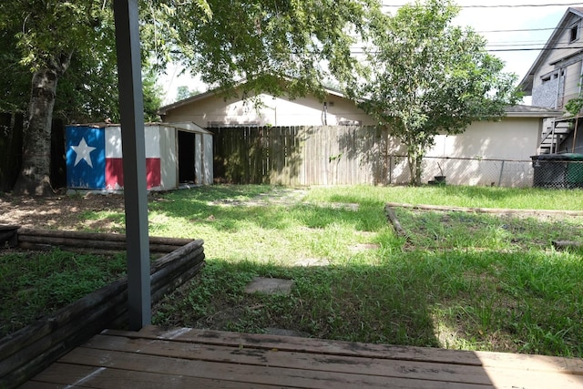 4737 Jefferson St, Houston, TX 77023 - view of yard featuring a wooden deck