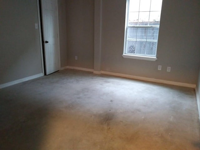 2152 William Tell St, Houston, TX 77093 - spare room featuring concrete flooring and baseboards