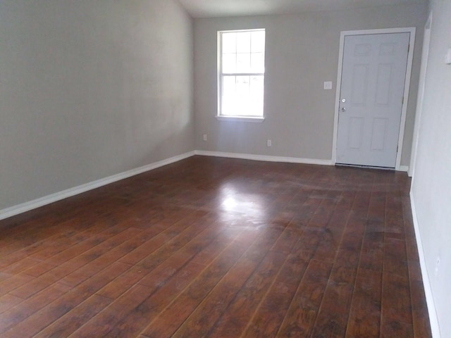 2152 William Tell St, Houston, TX 77093 - empty room featuring dark wood-style floors and baseboards
