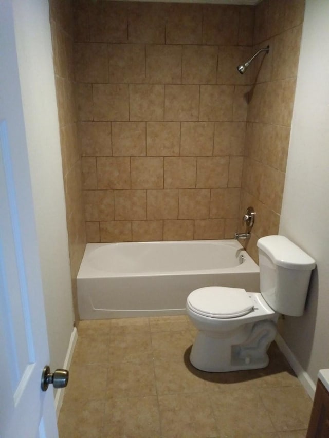 2152 William Tell St, Houston, TX 77093 - full bathroom featuring toilet, tile patterned flooring, baseboards, and shower / bathtub combination