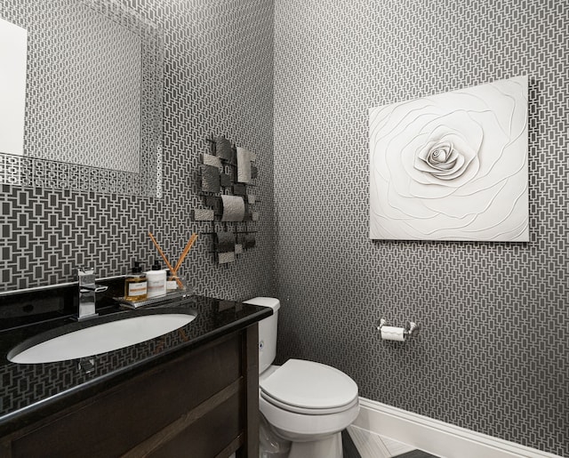 6407 Caparra Rock Ln, Sugar Land, TX 77479 - half bathroom featuring vanity, toilet, and tile walls
