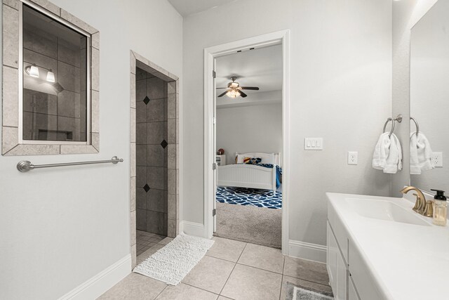 6407 Caparra Rock Ln, Sugar Land, TX 77479 - full bathroom featuring ceiling fan, vanity, walk in shower, tile patterned flooring, and baseboards