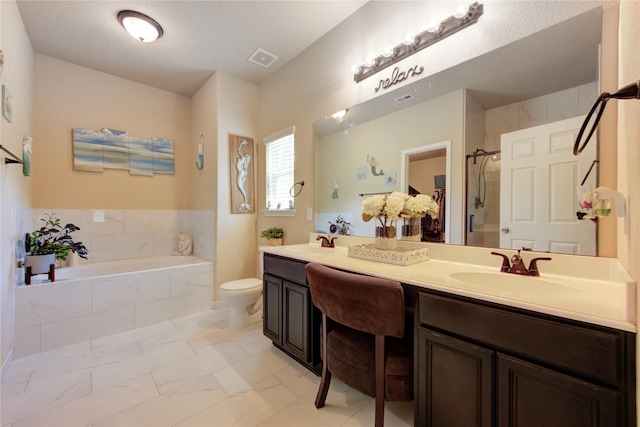 10531 Sunflower Dr, Willis, TX 77318 - bathroom with a bath, double vanity, toilet, a shower, and marble look tile flooring
