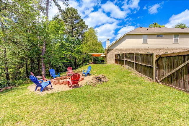 10531 Sunflower Dr, Willis, TX 77318 - view of yard featuring a fire pit