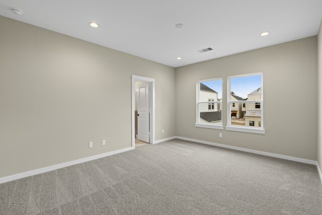 11326 Stonework Grove Ln, Houston, TX 77076 - carpeted empty room with baseboards and recessed lighting