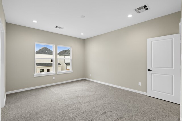 11326 Stonework Grove Ln, Houston, TX 77076 - carpeted empty room with baseboards and recessed lighting