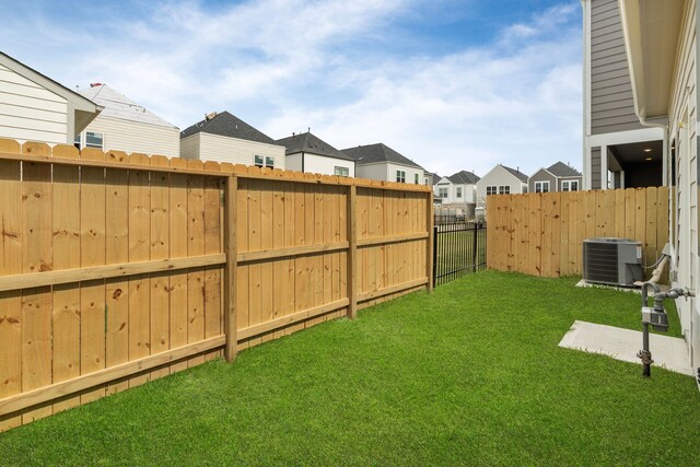 11326 Stonework Grove Ln, Houston, TX 77076 - view of yard featuring central AC unit and a residential view