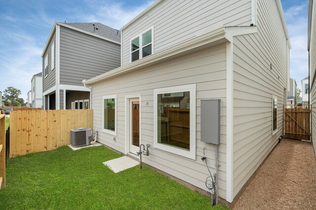 11326 Stonework Grove Ln, Houston, TX 77076 - back of property with central AC unit and a gate
