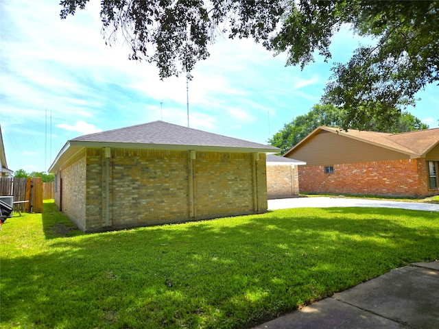 17223 Artwood Ln, Houston, TX 77489 - exterior space featuring brick siding and a detached garage