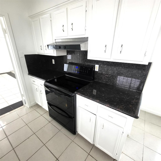 17223 Artwood Ln, Houston, TX 77489 - kitchen with electric range, under cabinet range hood, light tile patterned flooring, and backsplash