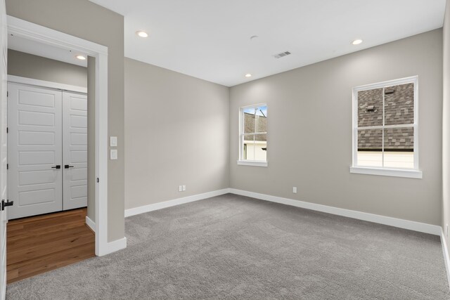 1139 W 22nd St, Houston, TX 77008 - empty room with carpet, baseboards, and recessed lighting