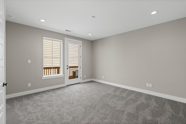 1139 W 22nd St, Houston, TX 77008 - unfurnished room featuring carpet flooring, recessed lighting, baseboards, and a smoke detector