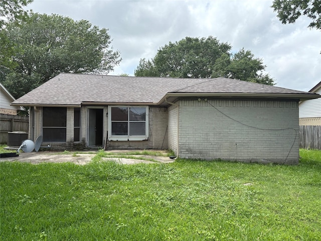 4934 Deerwood Cir, Baytown, TX 77521 - view of front facade with brick siding, a shingled roof, and cooling unit