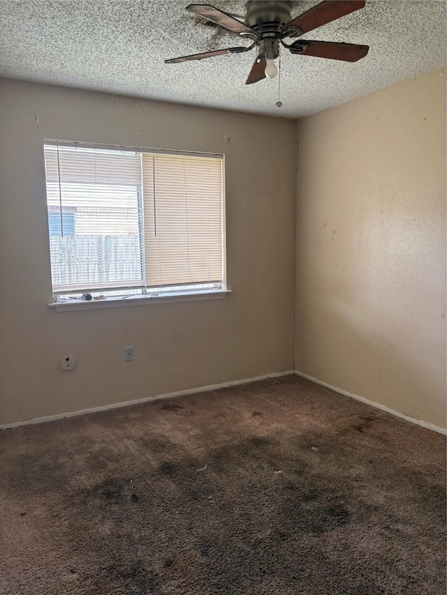 4934 Deerwood Cir, Baytown, TX 77521 - carpeted empty room with a ceiling fan, a textured ceiling, and baseboards