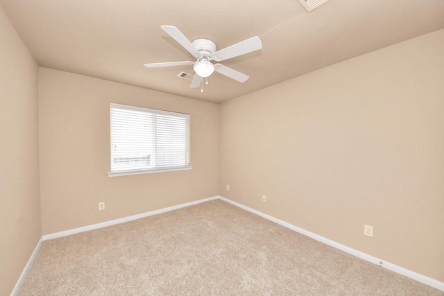 7315 Palmito Ranch Dr, Richmond, TX 77406 - spare room with carpet, baseboards, and ceiling fan