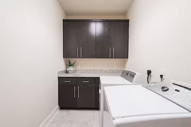 442 William D Fitch, College Station, TX 77845 - laundry area featuring cabinet space, separate washer and dryer, and baseboards