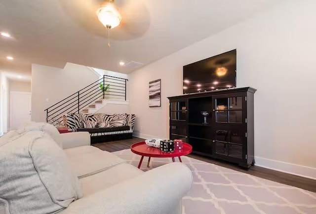 442 William D Fitch, College Station, TX 77845 - living room with baseboards, wood finished floors, stairway, and recessed lighting