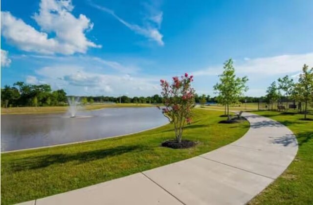 442 William D Fitch, College Station, TX 77845 - view of property's community with a lawn and a water view