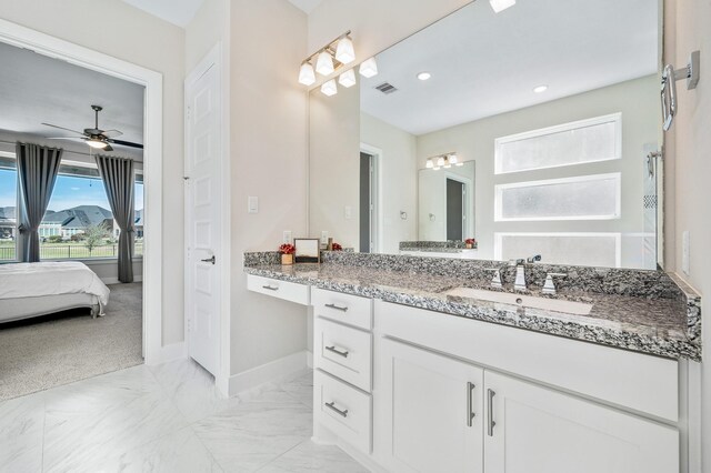 453 Stratus View Ct, Katy, TX 77493 - full bathroom with vanity, ensuite bath, baseboards, ceiling fan, and recessed lighting
