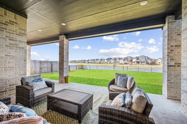 453 Stratus View Ct, Katy, TX 77493 - view of patio with a water view, a residential view, and an outdoor living space