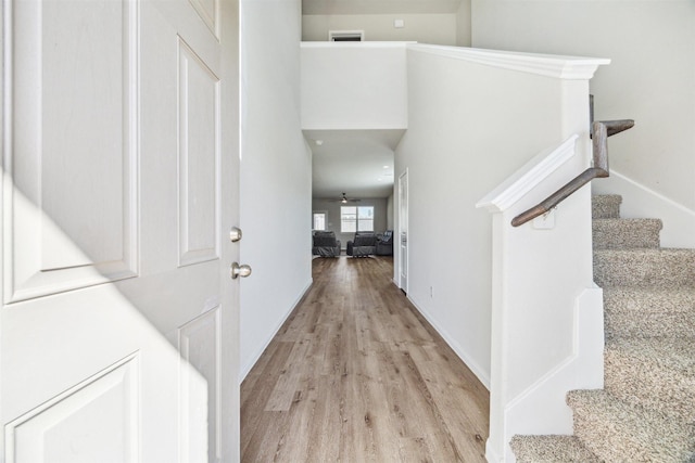 3685 Cub Dr, Conroe, TX 77301 - entrance foyer featuring light wood-type flooring, stairway, and ceiling fan