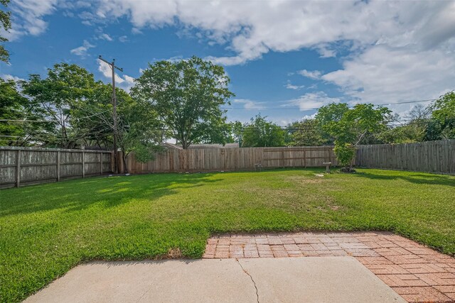 7130 Walkway St, Houston, TX 77036 - view of yard featuring a patio area