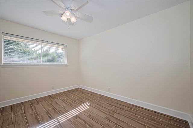 7130 Walkway St, Houston, TX 77036 - spare room with wood tiled floors, baseboards, and ceiling fan