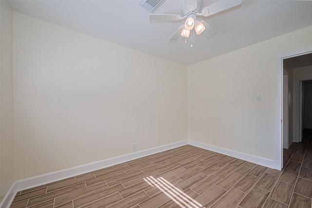 7130 Walkway St, Houston, TX 77036 - spare room with wood finish floors, baseboards, and ceiling fan