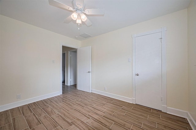 7130 Walkway St, Houston, TX 77036 - unfurnished room featuring wood finish floors, baseboards, and ceiling fan