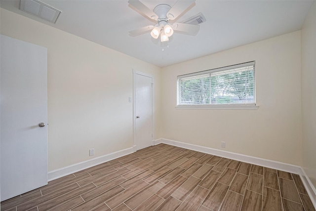 7130 Walkway St, Houston, TX 77036 - unfurnished room featuring wood finish floors, baseboards, and a ceiling fan