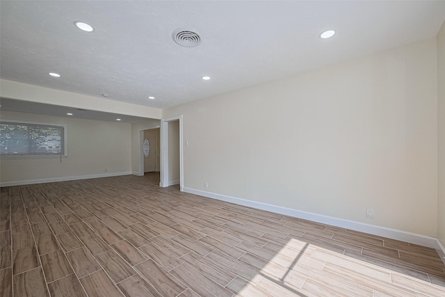 7130 Walkway St, Houston, TX 77036 - empty room featuring wood finish floors, recessed lighting, and baseboards