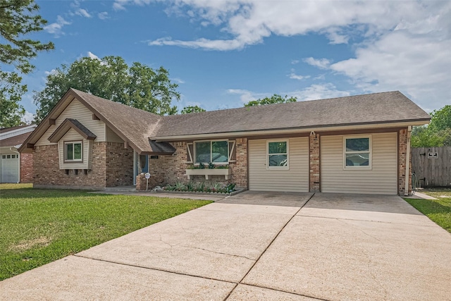 7130 Walkway St, Houston, TX 77036 - view of front facade featuring brick siding, driveway, and roof with shingles