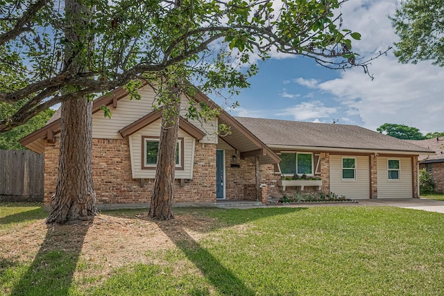 7130 Walkway St, Houston, TX 77036 - view of front facade with brick siding and a shingled roof