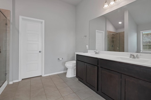 2314 Brickfielder Ln, Baytown, TX 77523 - bathroom with a stall shower, double vanity, and tile patterned floors